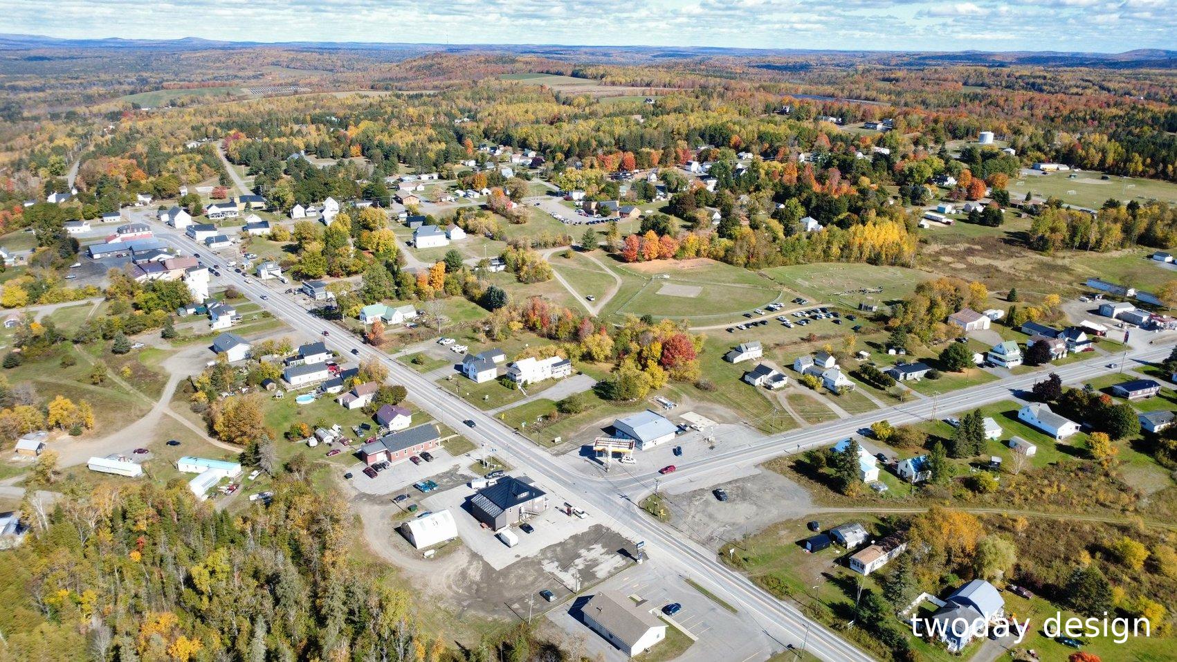 Aerial view of Main Street running through town in fall